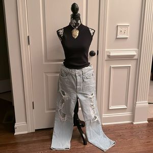 HALSTON ribbed sleeveless mock neck top